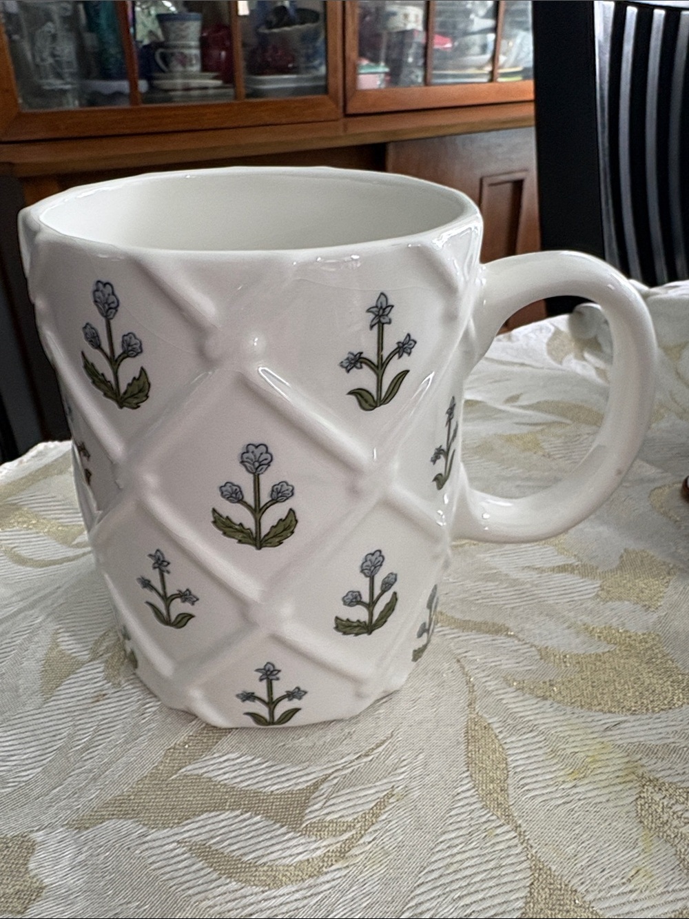 White Floral Quilted Ceramic Mug with Blue Flower Accents
